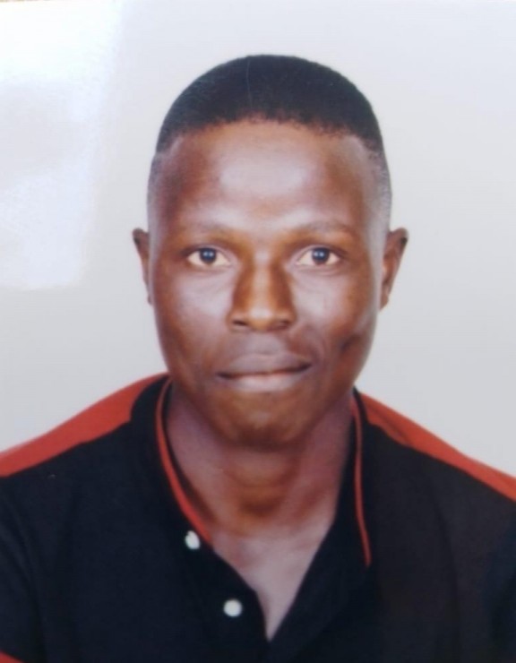DICKENS MUFUAYA current passport photograph