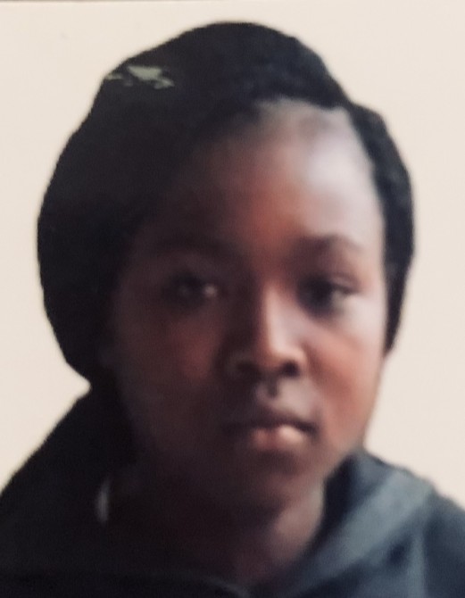 WAITHERA FAITH current passport photograph