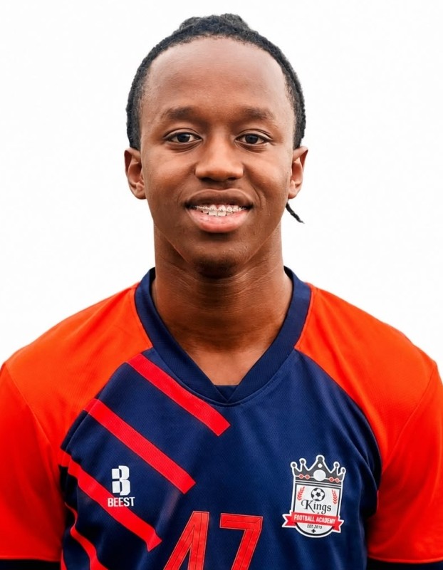 Jason Muhanji current passport photograph