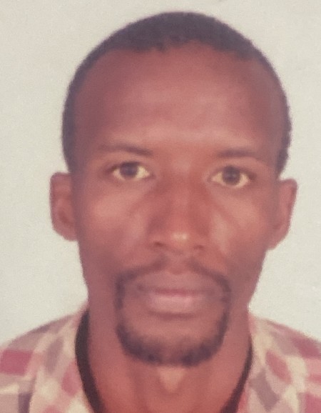Anthony Kibue current passport photograph