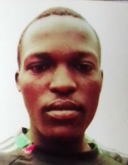 ROBERT MOCHAMA current passport photograph