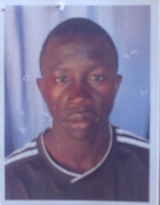 Kevin Owino current passport photograph