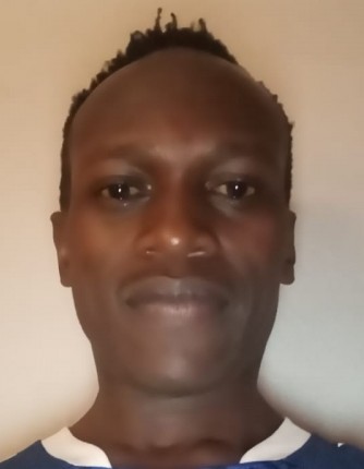 STEPHEN AKUKU current passport photograph