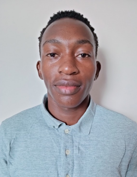 EZRA BARASA current passport photograph
