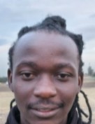 Davis Omollo current passport photograph