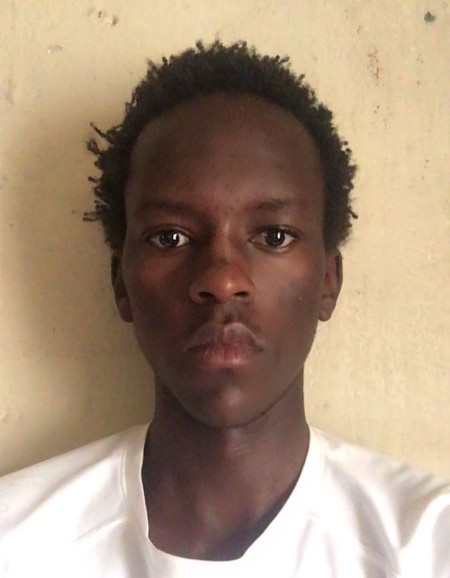 LESLIE MAINA current passport photograph