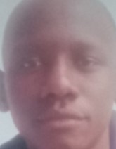 Kevin Lomodei current passport photograph