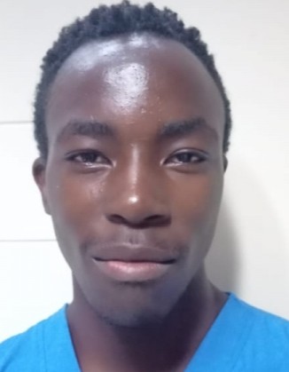 Tevin Maina Irungu current passport photograph