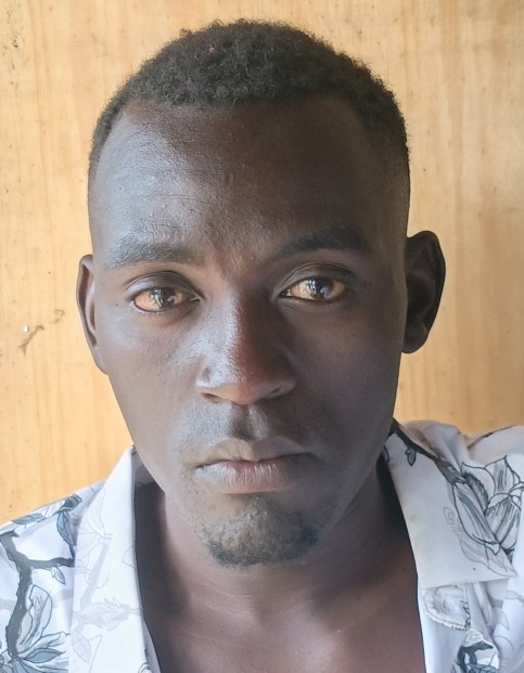 HILLARY WESONGA current passport photograph