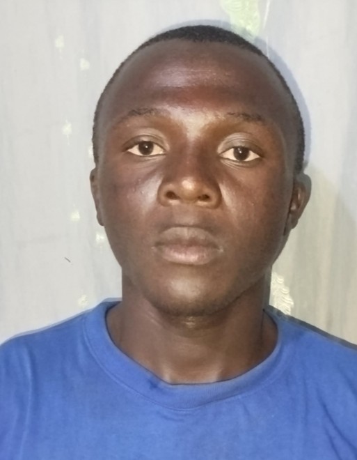 Roy bronson Nyowino current passport photograph