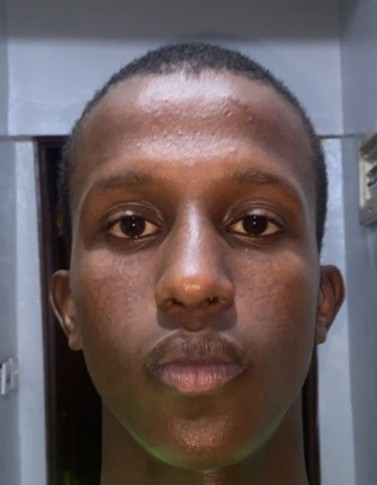 Ayub Abshir Elmi current passport photograph