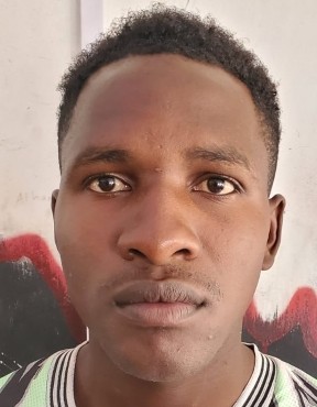 maxwell munene joseph current passport photograph