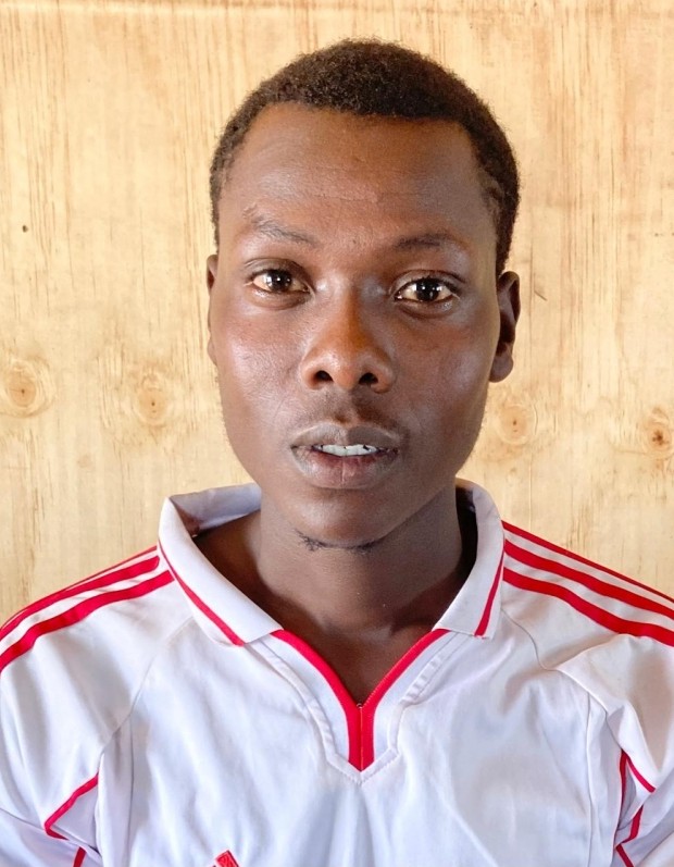 MILTON ESENDI MUSUNGU current passport photograph