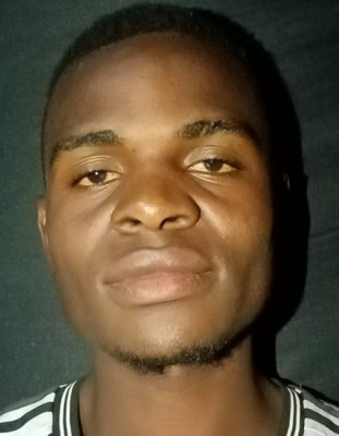Brian Wayayi current passport photograph