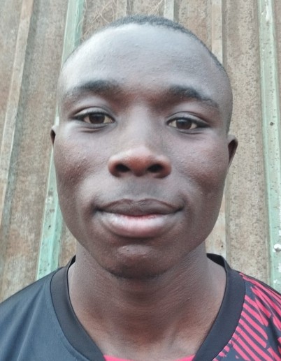 Nicholas Amakobe current passport photograph