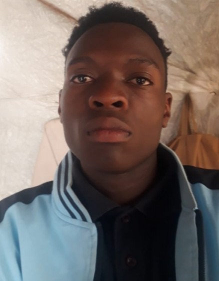 Musa Simiyu current passport photograph