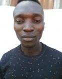 Sammy Muhanji current passport photograph