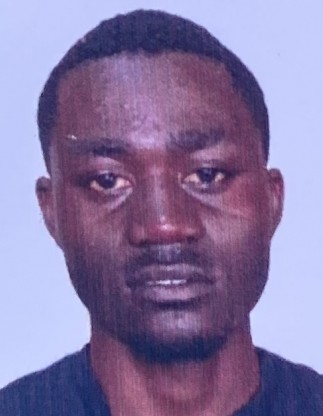 HILLARY MUSALIA current passport photograph