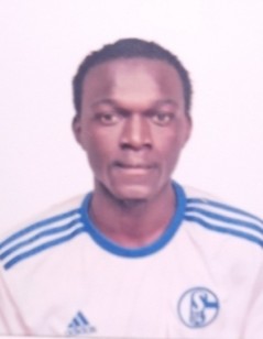 Morgan Ouma current passport photograph