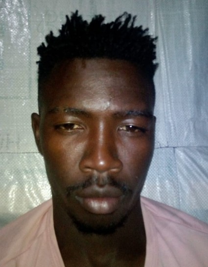 MOSES AMAYI current passport photograph