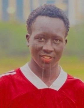 William Deng current passport photograph