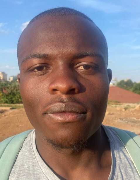 Faiz Mafuga Mshiri current passport photograph