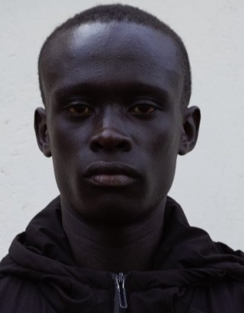 Robert Kamau current passport photograph
