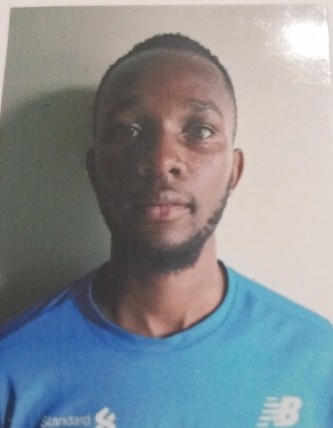 Mark Mueke current passport photograph