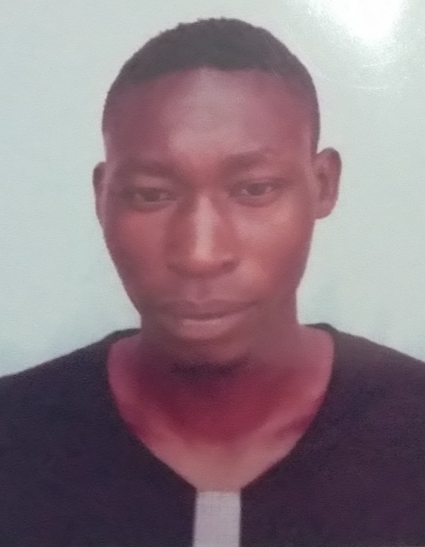 JAMES MUIMI current passport photograph