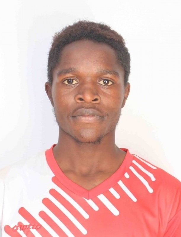 Brigan Beru current passport photograph
