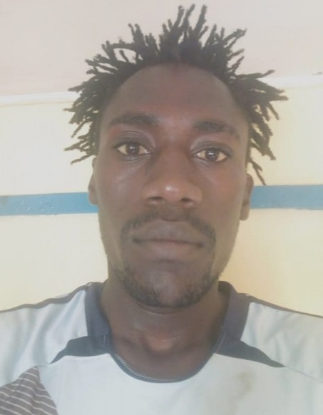 Oscar Yasir Anyonje current passport photograph