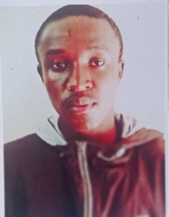 ERIC MWOKA current passport photograph