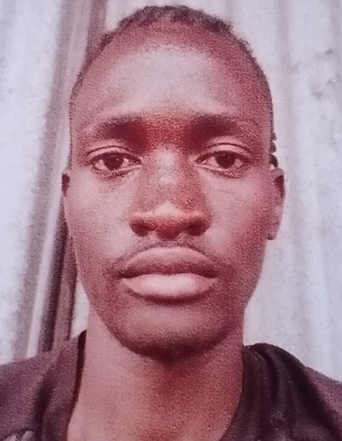 DOUGLAS OSIDA OTIENO current passport photograph